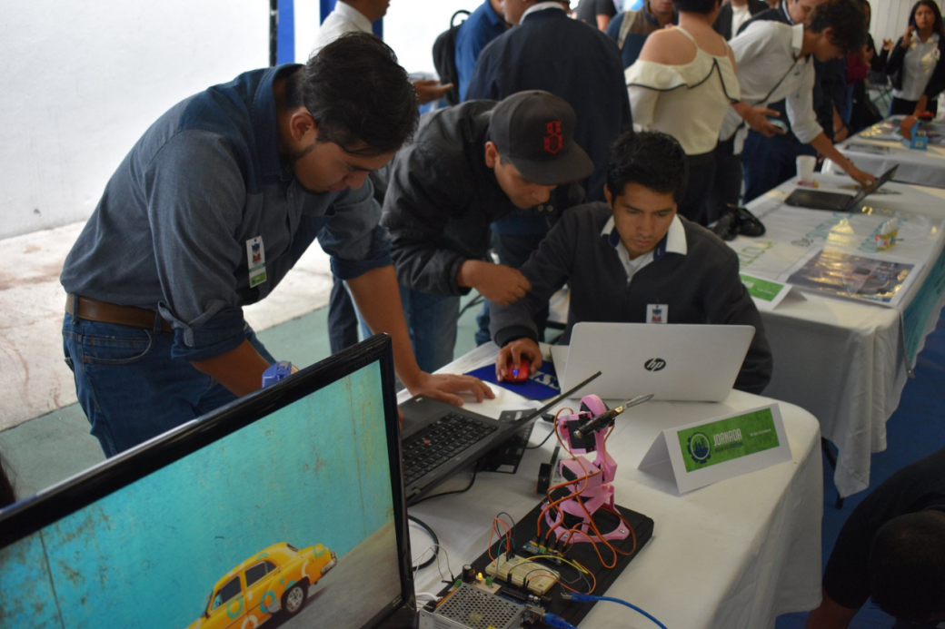 Participants were performing their works of the robot arm.png